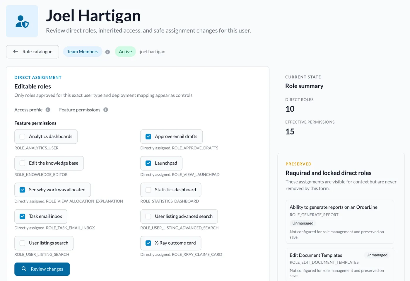 Role management for a team member, with each permission as a switch and a summary of what they can do.
