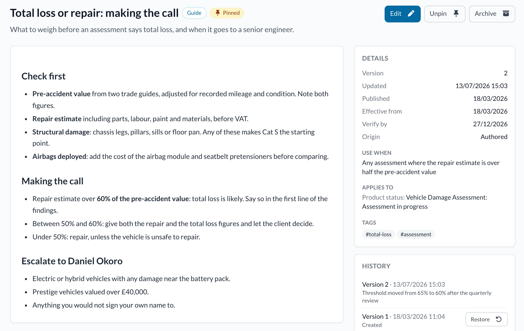 A knowledge base entry on deciding between repair and total loss, with its version history.