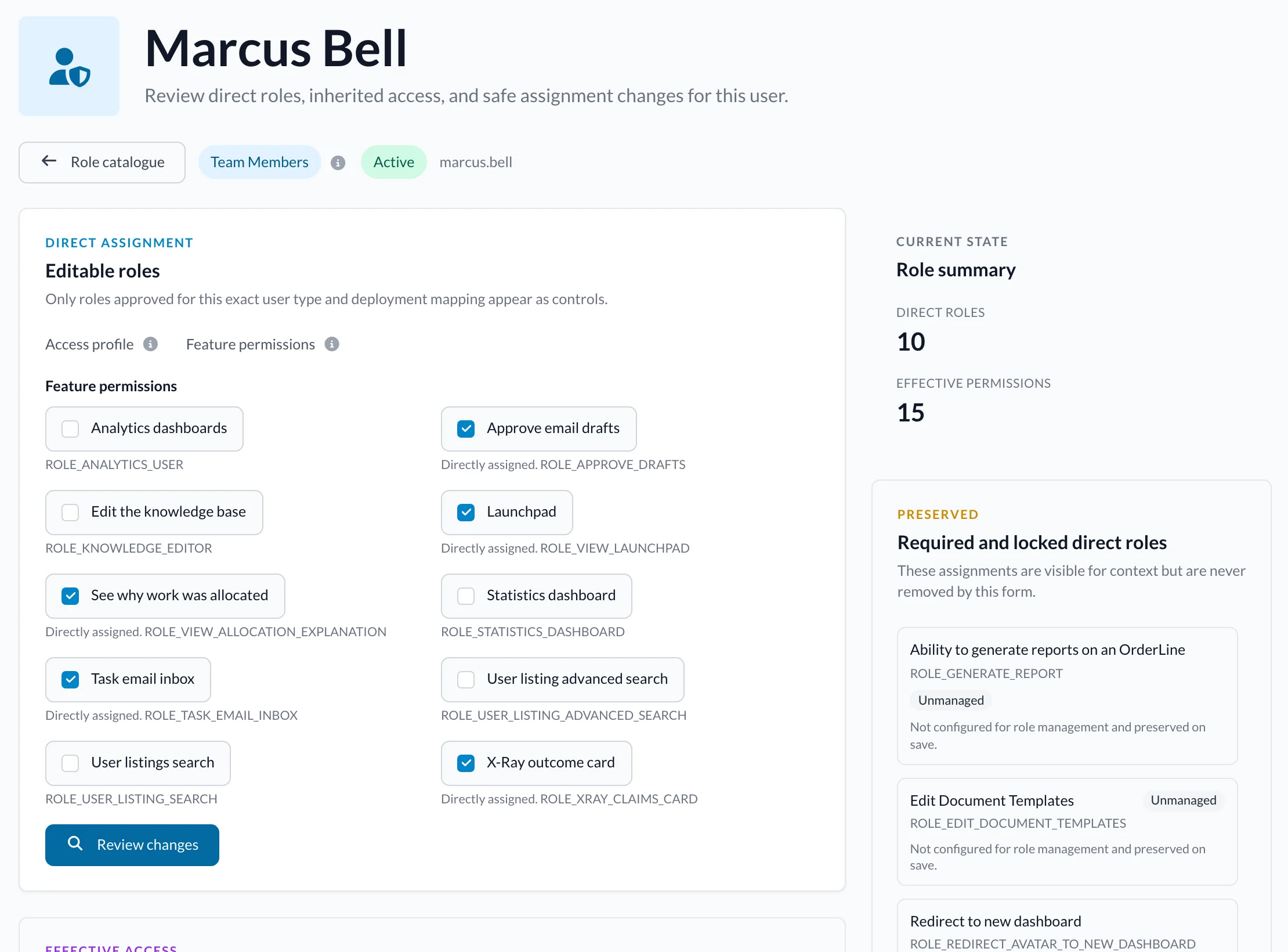 Role management for a member of staff, with feature permissions as switches and a summary of effective access.
